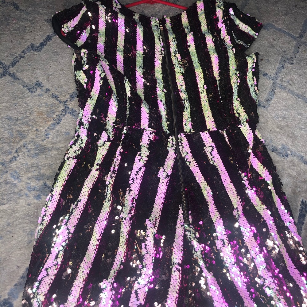 "Akira" sequenced romper.